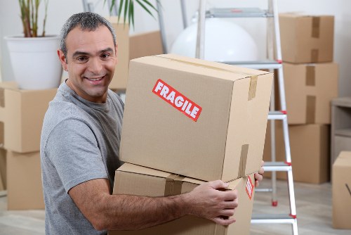 Removal team preparing a move in Soho streets