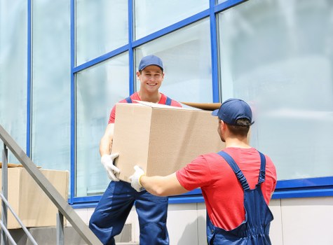 Office furniture and equipment being handled for a Soho move