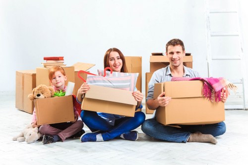 Mover using protective equipment during a house removal