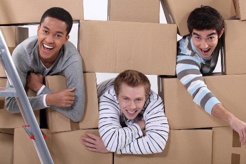 Professional office removals planning in Soho with packed boxes and workspace preparation