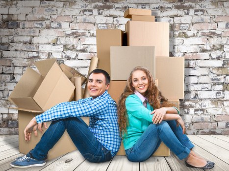 Careful packing materials and labeled boxes used in Soho relocation services