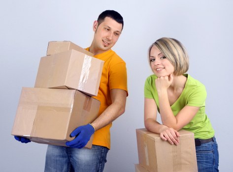 Business relocation using a moving truck in Soho with office furniture