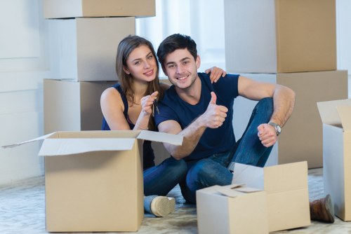 Professional movers handling furniture in Soho