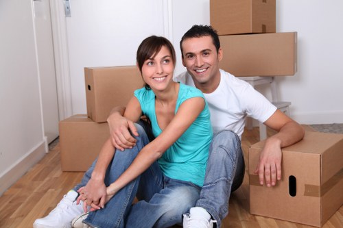 Professional movers navigating a busy Soho street