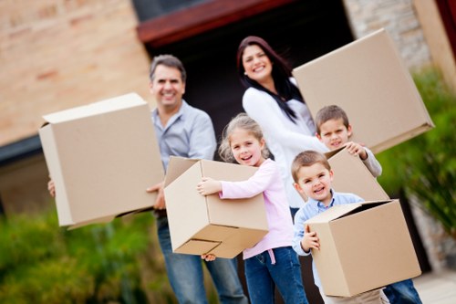 Professional movers handling office furniture in Soho