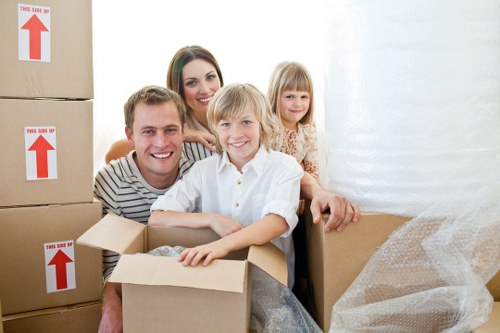 Packed moving boxes and protective wrapping for a Soho relocation